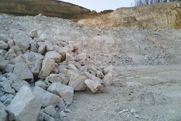 Open pit mining of construction sand stone materials