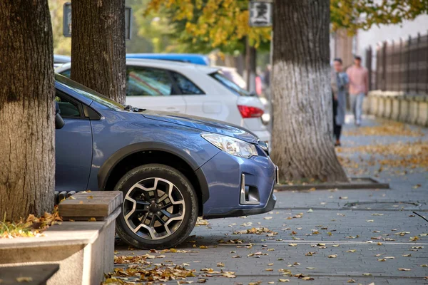 Close up of a car parking illegally against traffic rules on pedestrian city street side — Stock fotografie