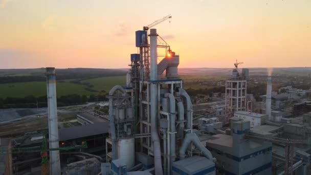 Aerial view of cement factory tower with high concrete plant structure at industrial production area. Manufacturing and global industry concept — Stock Video