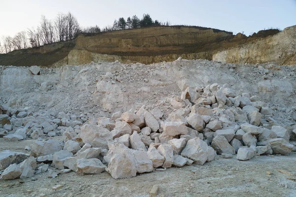 Open pit mining of construction sand stone materials