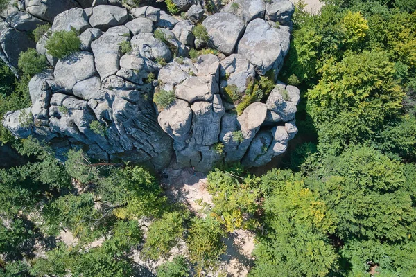 Aerial view of large rocky formations with snone boulders and mountain high cliffs — Stock Photo, Image