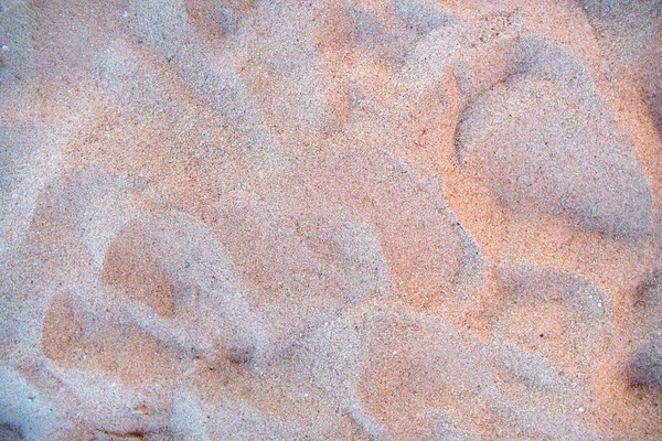 Płaski widok czystej żółtej powierzchni piasku pokrywającej nadmorską plażę. Tekstura piaskowa — Zdjęcie stockowe