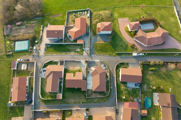 Aerial view of residential houses in green suburban rural area — Photo