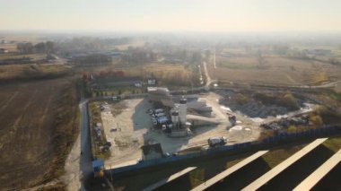 Processing factory at mining site producing cement construction materials and solar power plant