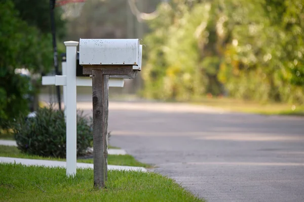 Typical american outdoors mail box on suburban street side — Stockfoto