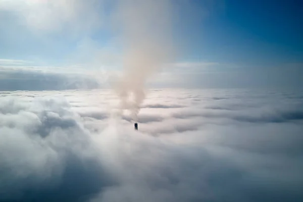 Coal power plant high pipes with black smoke moving upwards over clouds polluting atmosphere. Production of electrical energy with fossil fuel concept — 스톡 사진