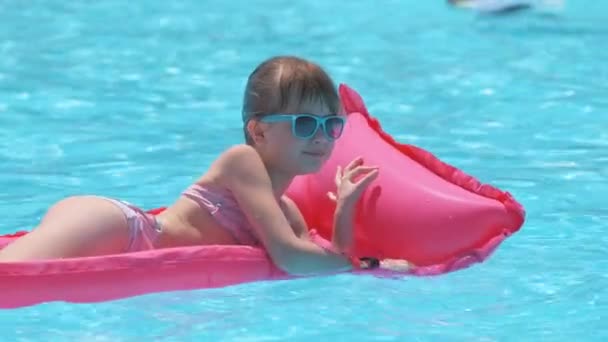 Young Child Girl Relaxing Summer Sun Swimming Inflatable Air Mattress — Stock Video