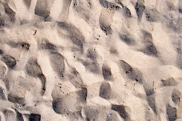 海辺のビーチをカバーきれいな黄色の砂の表面のフラットビュー — ストック写真