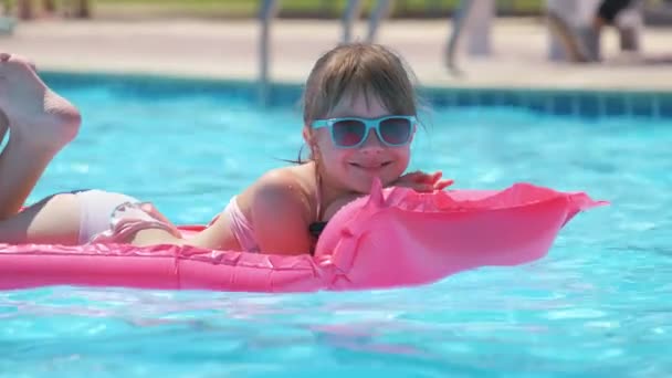 Happy Child Girl Relaxing Inflatable Air Mattress Swimming Pool Sunny — Stock Video