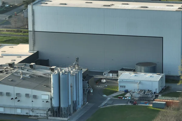 Aerial view of new factory building for producing and shipping of industrial equipment.