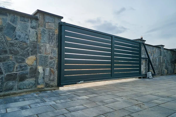 Wide Automatic Sliding Gate Remote Control Installed High Stone Fense — стоковое фото