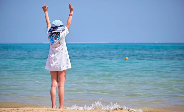 Rear View Child Girl White Dress Hat Standing Barefoot Arms — Fotografia de Stock