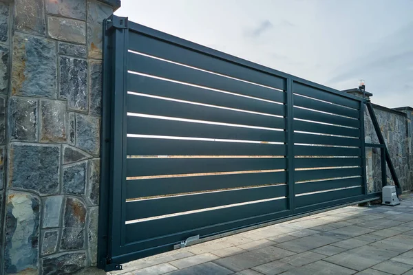 Wide Automatic Sliding Gate Remote Control Installed High Stone Fense — стоковое фото