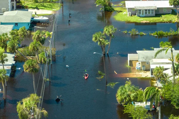 Hurricane Ian flooded houses in Florida residential area. Natural disaster and its consequences.