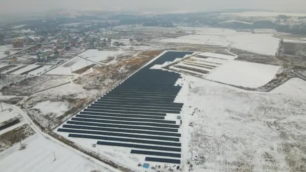 Aerial View Electrical Power Plant Solar Panels Covered Snow Melting — Vídeos de Stock