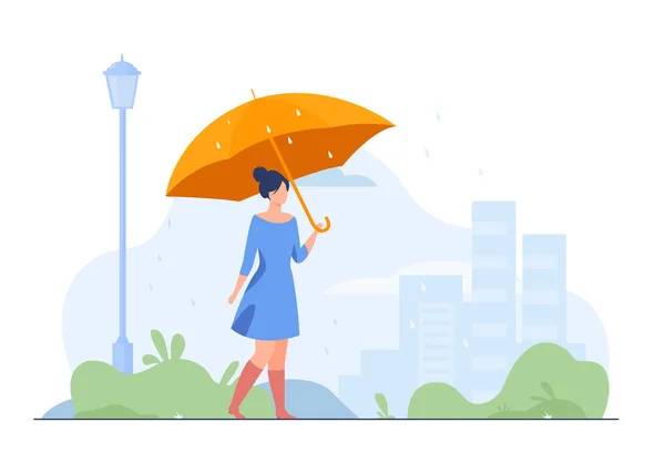 Young girl with orange umbrella flat vector illustration. Woman walking in rainy weather in park. City buildings on background. Rain season. Autumn and landscape concept.
