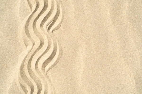 Texture de fond de sable marin gros plan avec ornement — Photo