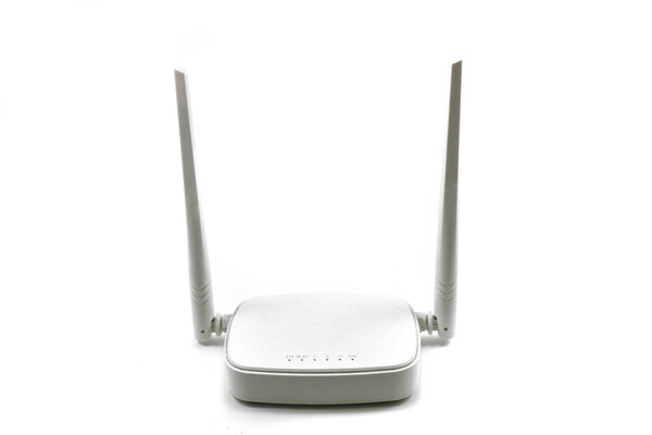 White wireless internet router with two antennas isolated on white background
