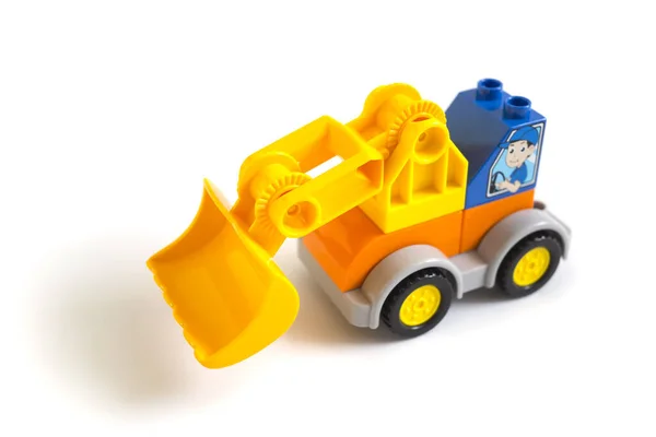 Bulldozer Plastic Speelgoed Met Oranje Universele Kling Geïsoleerd Witte Achtergrond — Stockfoto