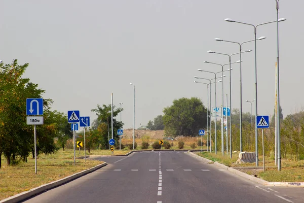 traffic direction sign white arrow on blue background