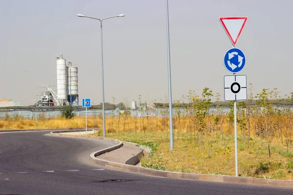 traffic direction sign white circle arrow on blue background