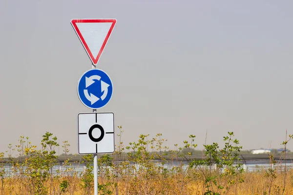 traffic direction sign white circle arrow on blue background