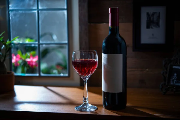 Red Wine Glass Bottle Wood Table Window — Foto Stock