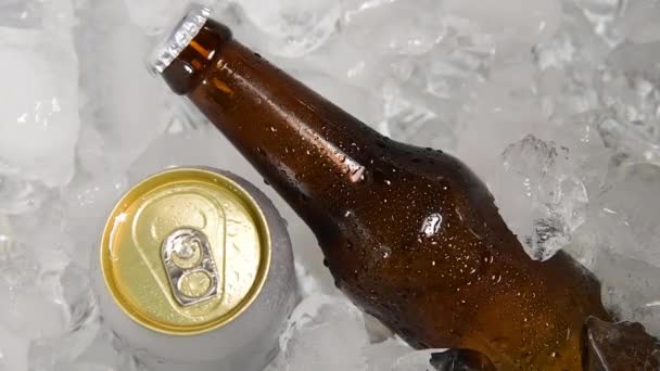 Zoom Footage Beer Bottle Can Chilled Ice — стоковое видео