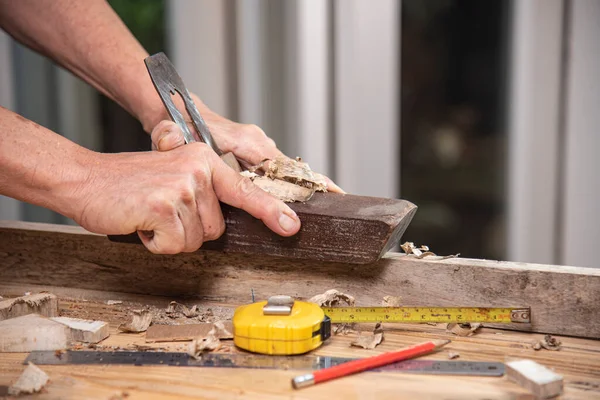 Man Hands Using Carpenter Plane Wood Plank — Foto de Stock