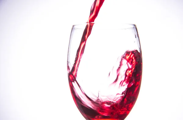 Closeup Shot Red Wine Pouring Glass Isolated White Background — Foto Stock