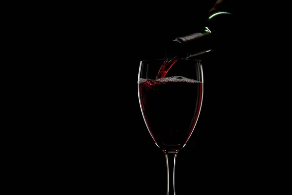 Pouring Red Wine Glass Isolated Black Background — Foto Stock
