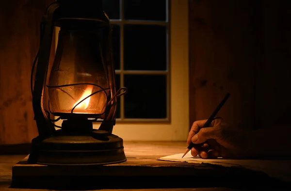 Person Hand Writing Kerosene Lamp Lighting — ストック写真