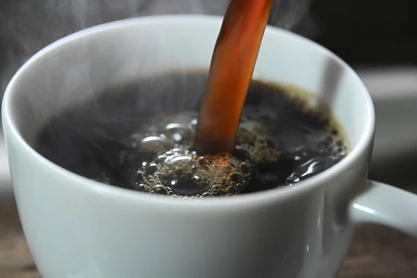 Pouring Hot Coffee Cup Closeup — 스톡 사진