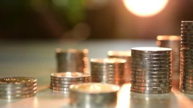  tracking dolly shot of coins stack
