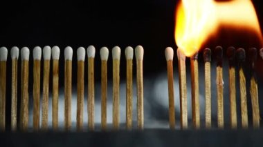 matchstick in row burning from one to another and stop cause of distance in between