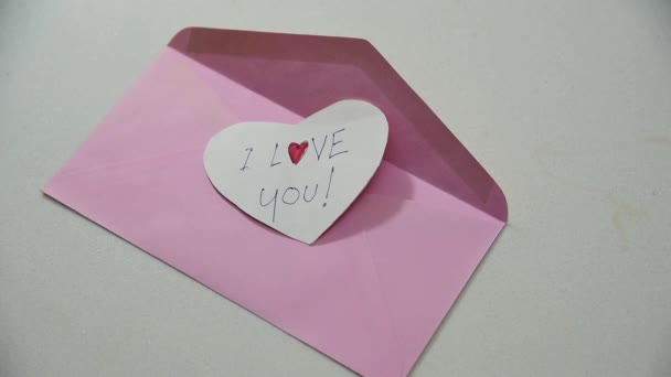 Person Hands Put Paper Letter Heart Shape Envelope — Vídeo de Stock