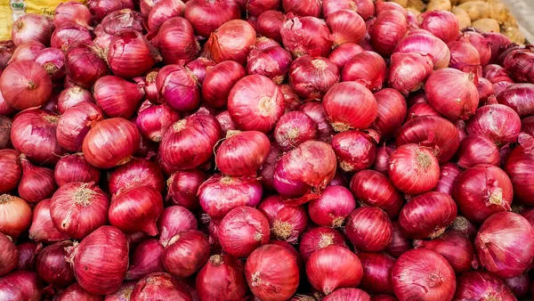 Full Frame Shot Of Purple Onions. Fresh whole purple onions and one sliced onion.