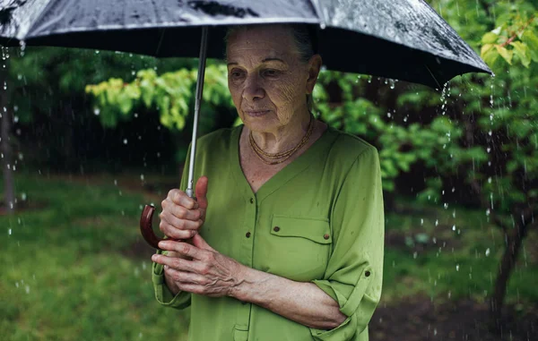 Old Woman Stands Street Rain Black Umbrella Royalty Free Stock Images