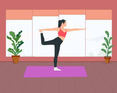 Egzersiz yapan veya yoga yapan genç bir kadın.