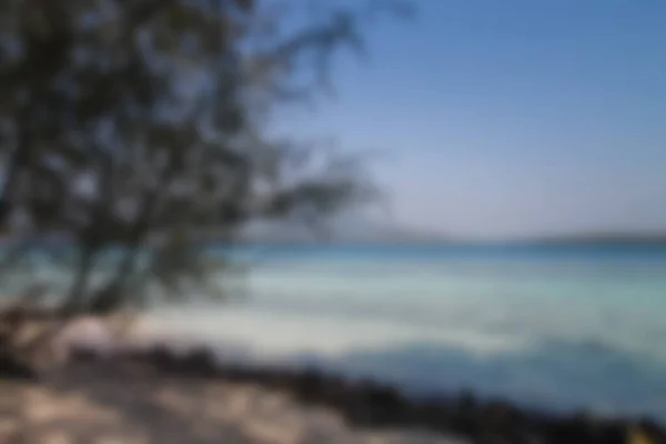 Niewyraźne Tło Widok Tropikalnej Plaży Fali Światła Słonecznego Abstrakcyjne Tło — Zdjęcie stockowe