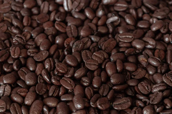 Καφέ Ψημένο Καφέ Φασόλια Closeup Σκούρο Φόντο Υψηλής Ποιότητας Φωτογραφία — Φωτογραφία Αρχείου