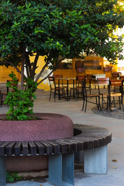 Summer cafe in the morning sun waiting for visitors.