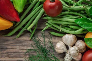 Green fresh asparagus beans close-up. Healthy food. Harvest from your own garden. Raw green bean pods . asparagus with spices. healthy food .Healthy breakfast delicious. Top view flat lay. Copy space.
