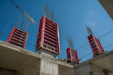 Column formwork and crane on house constructio