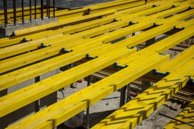 Props and wood beam in housing construction
