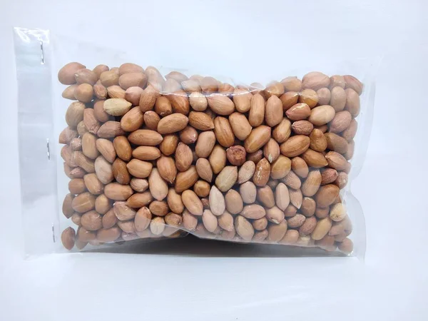 Peanuts wrapped in plastic packaging. Peanuts can be boiled to be eaten directly, or in addition to vegetables, or as a traditional Indonesian food peanut sauce.