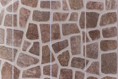 Taş duvarın dokusu. Eski kale taşından duvar dokusu. Arka plan ya da doku olarak taş duvar. Arkaplan veya doku için taş duvarın bir parçası