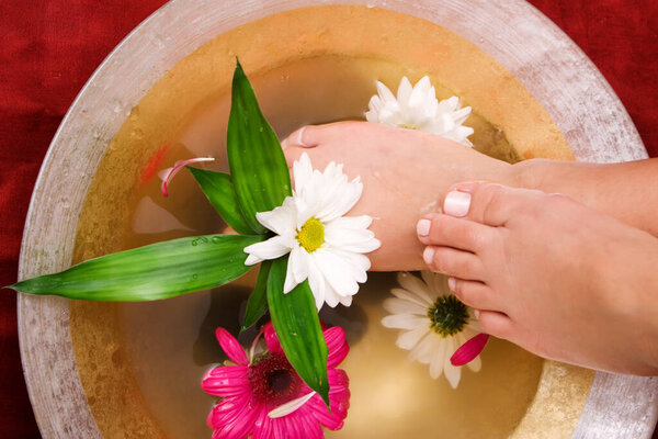 Woman taking care of her feet