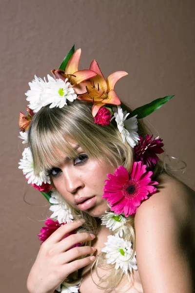 Woman with daisies on her hair