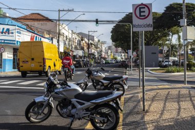 Marilia, Sao Paulo, Brazil, July 27, 2022. Reserved parking spaces for motorcycles on Nove de Julho street, downtown Marilia
